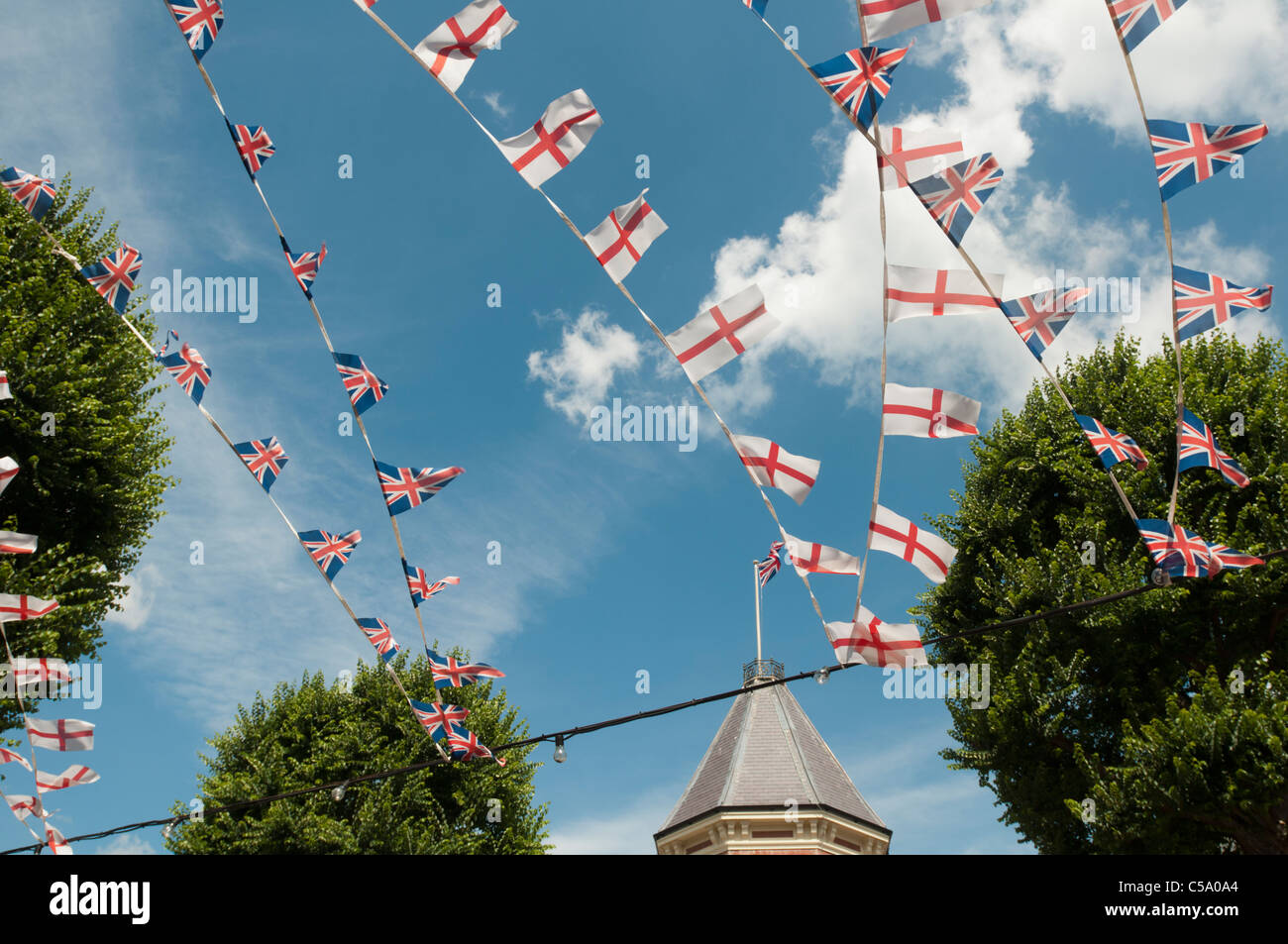EASTBOURNE, ENGLAND 14th July 2011 - Flags and bunting fly outside a pub. Stock Photo