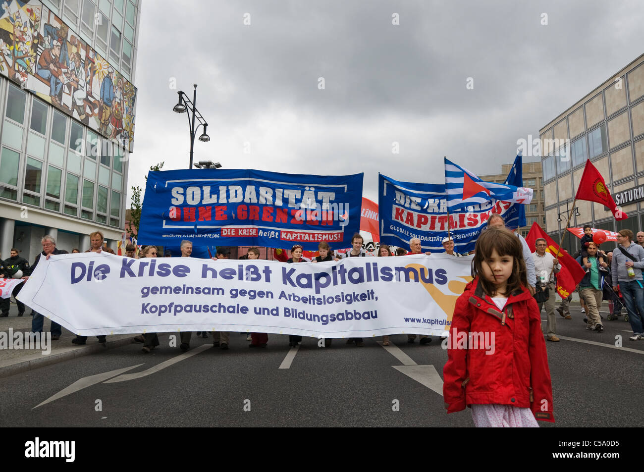 Demonstration in Berlin, anti capital crisis with small girl in front Stock Photo