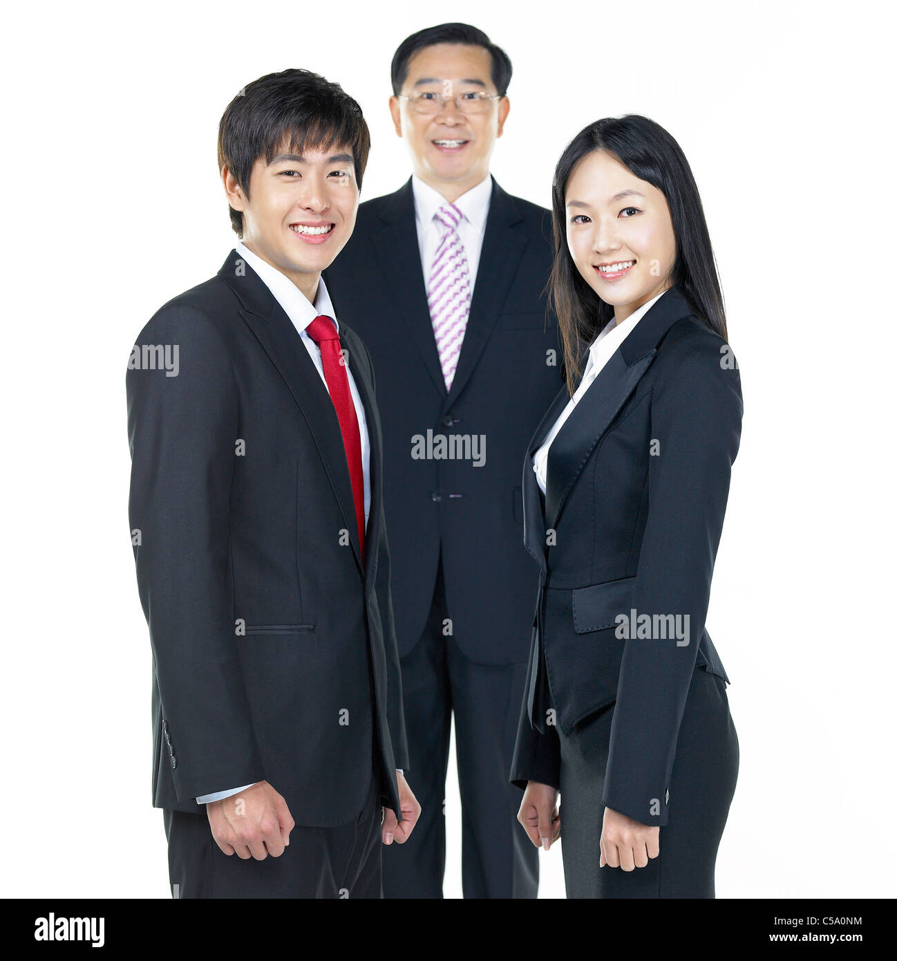 Portrait of businesspeople standing Stock Photo - Alamy