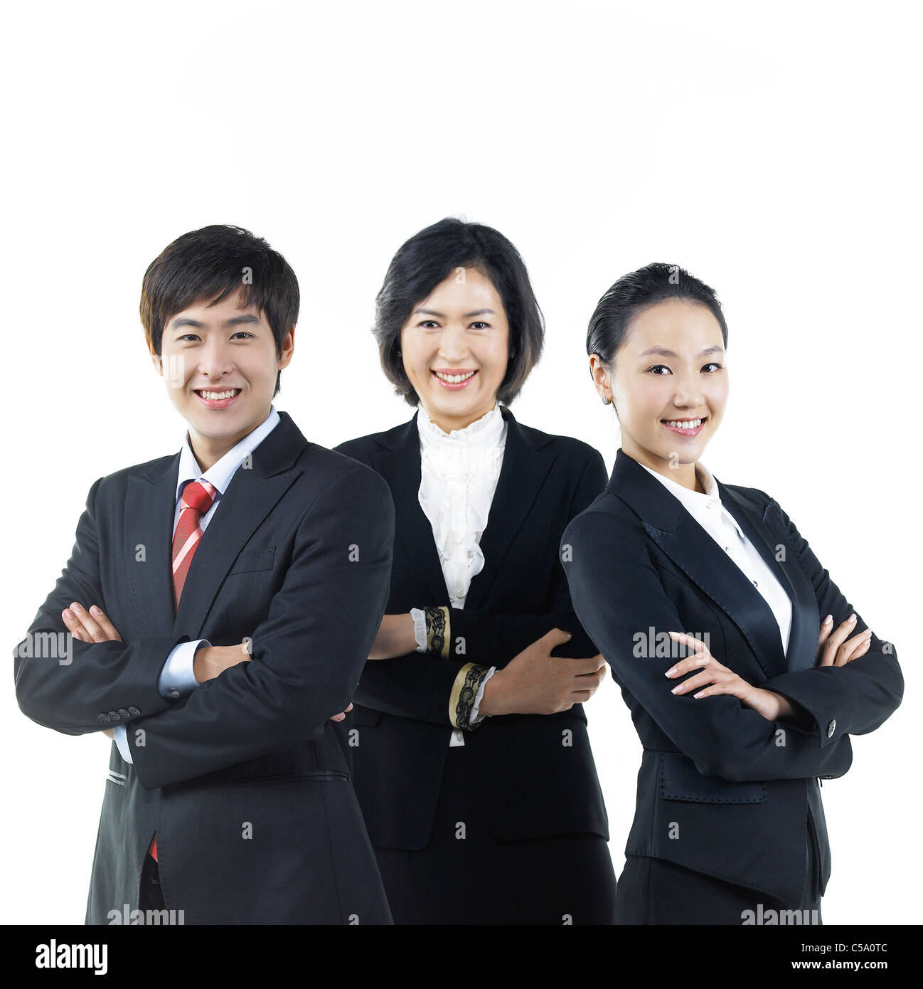 Portrait of businesspeople standing Stock Photo - Alamy