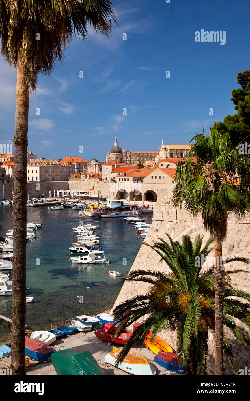The tiny harbor and orange roofs of Dubrovnik, Dalmatia Croatia Stock Photo