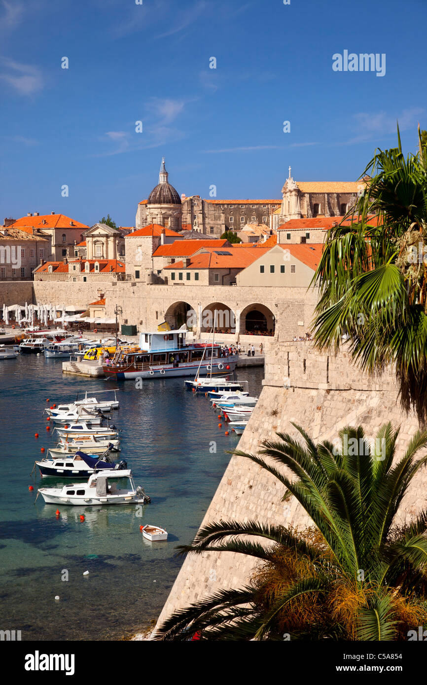 The tiny harbor and orange roofs of Dubrovnik, Dalmatia Croatia Stock Photo