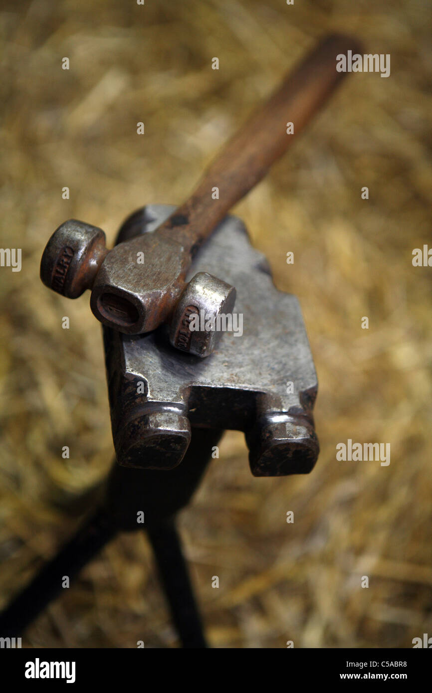 A hammer and anvil of a blacksmith Stock Photo