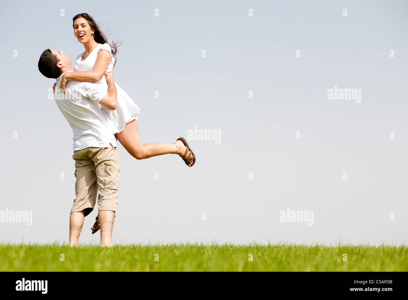 Romantic young couple fooling around hi-res stock photography and ...