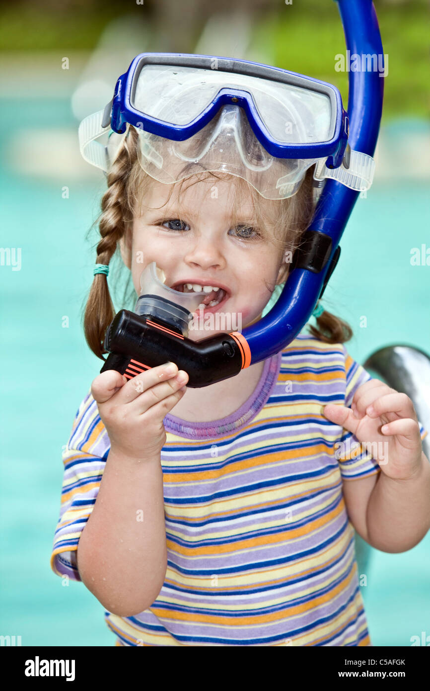 Child in protective goggles swimming pool Stock Photo Alamy