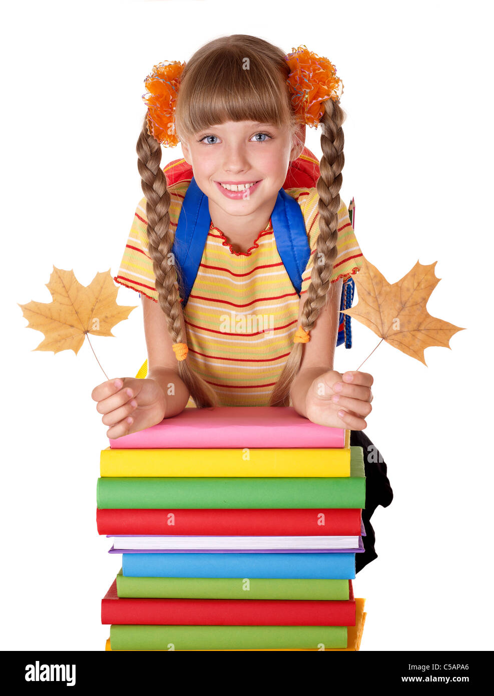Schoolgirl with backpack holding stack of books Stock Photo - Alamy