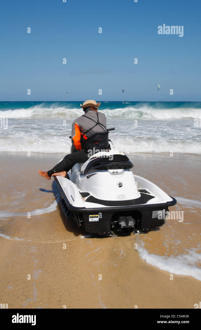 Lifeguard on Jet ski at Windsurfing/Kitesurfing centre on Sotavento beach, Jandia, Fuerteventura, Canary Islands Stock Photo