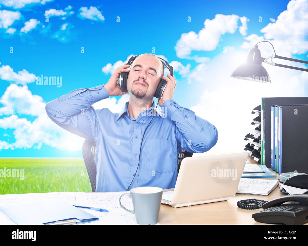 man listen music in nature Stock Photo