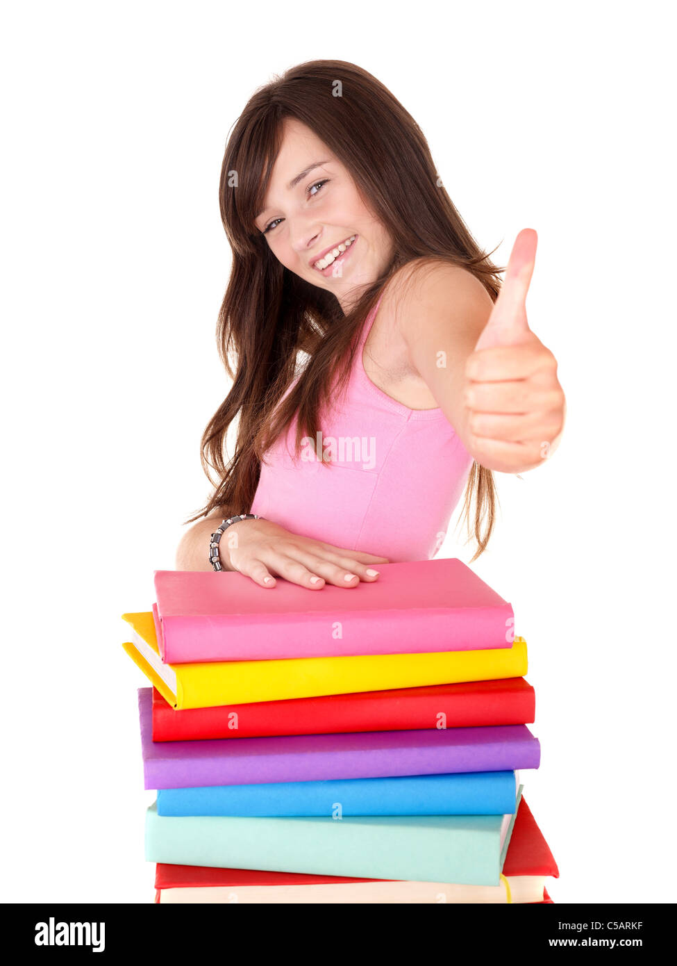 Girl with pile colored book Stock Photo - Alamy