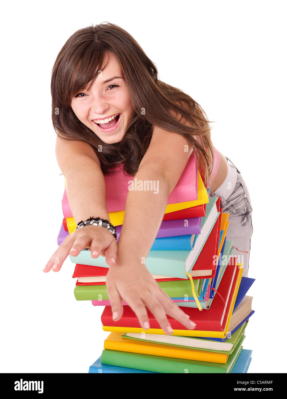 Girl with pile colored book Stock Photo - Alamy