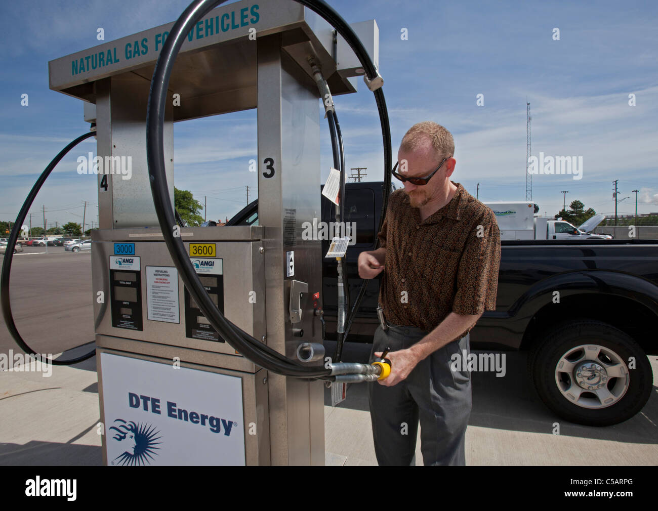 Compressed Natural Gas Vehicle Fueling Station Stock Photo Alamy