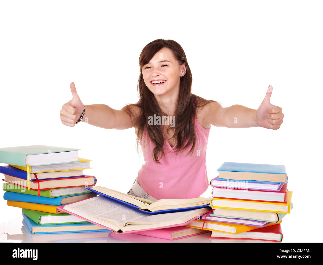 Girl with pile colored book Stock Photo - Alamy