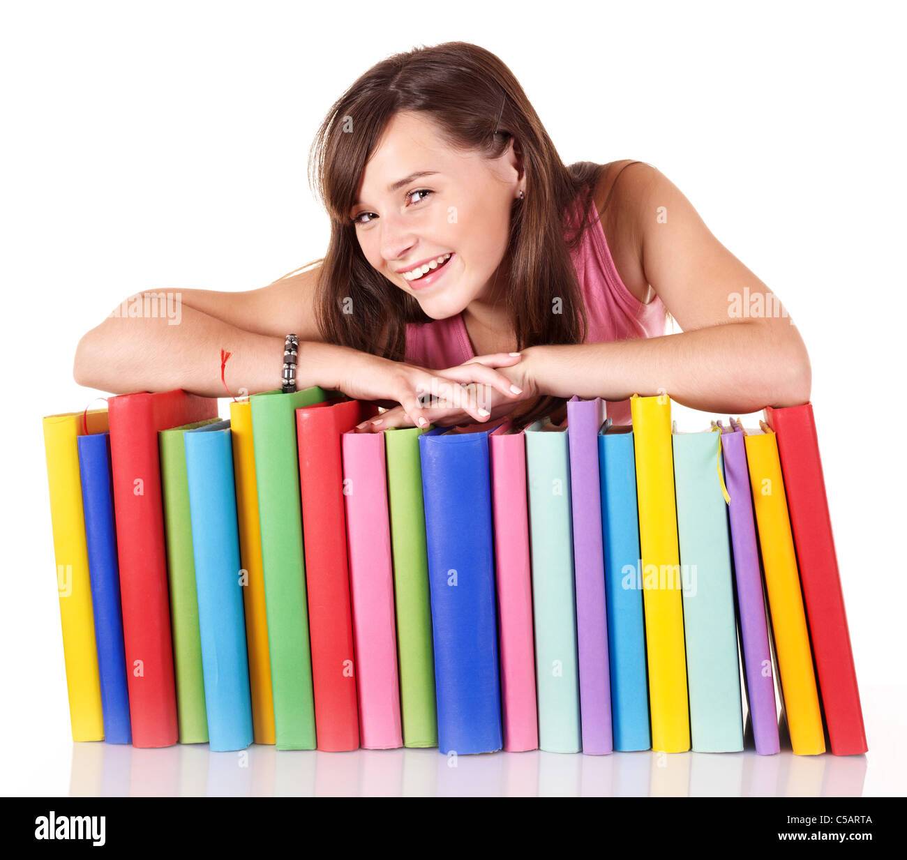 Girl with pile colored book Stock Photo - Alamy