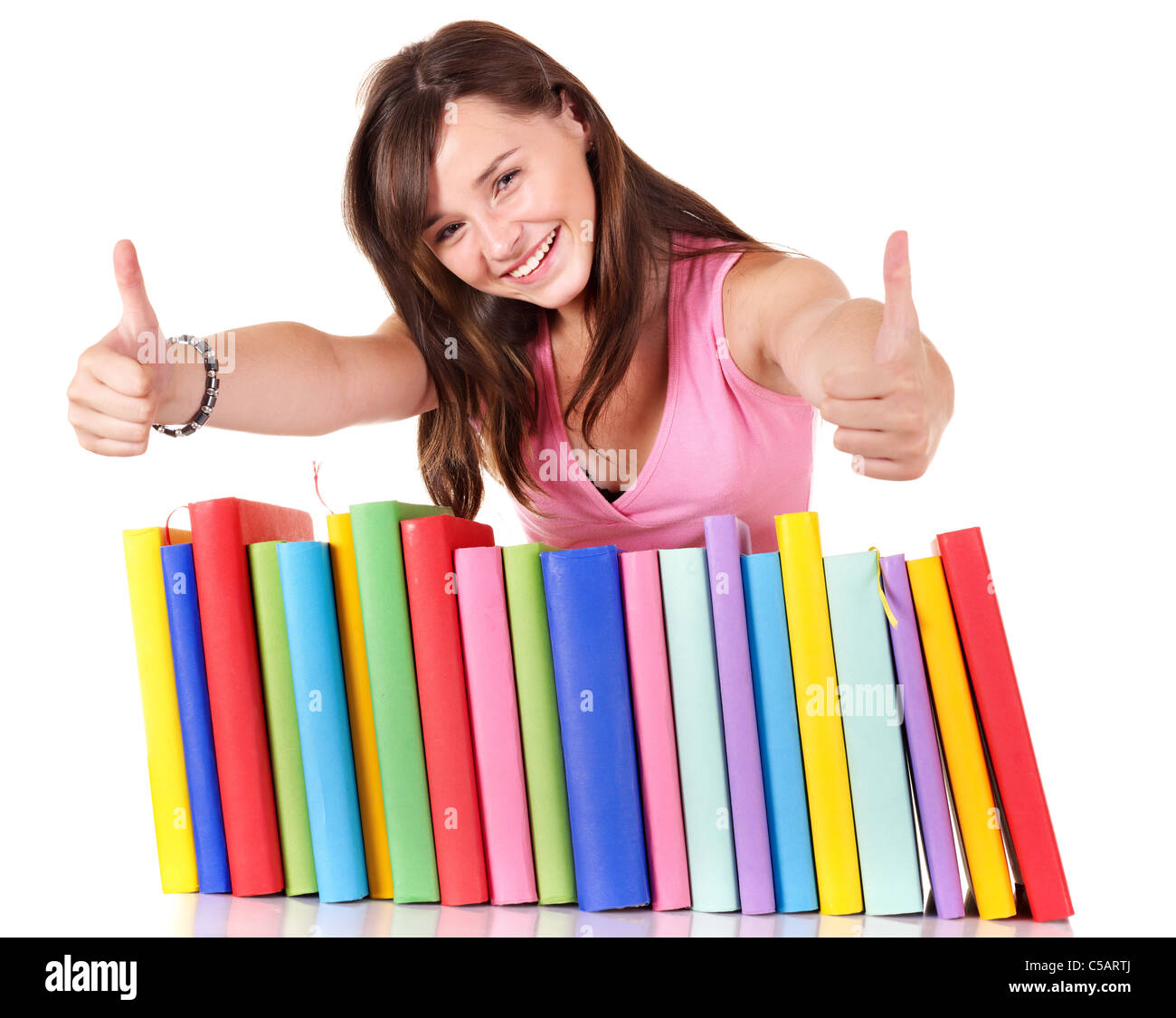 Girl with pile colored book Stock Photo - Alamy