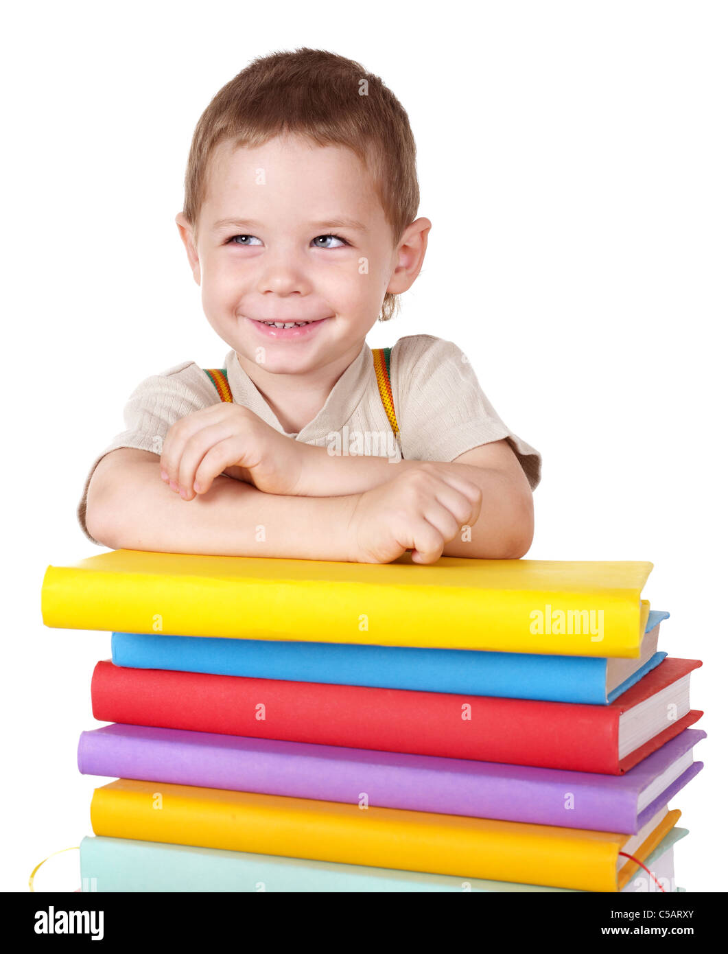 Little boy reading pile of books Stock Photo - Alamy