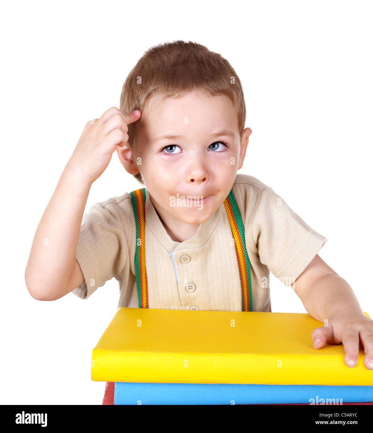 Little boy reading pile of books Stock Photo - Alamy