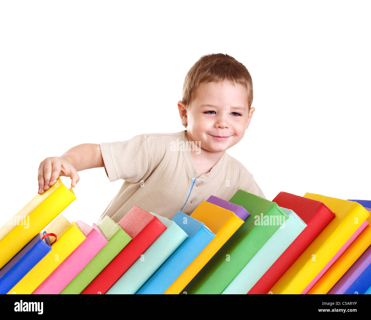 Little boy reading pile of books Stock Photo - Alamy