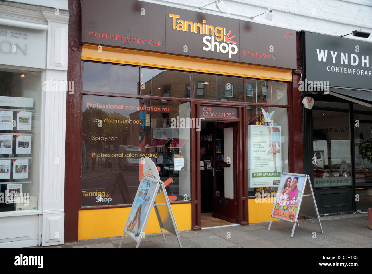 The Tanning Shop branch on Chiswick High Road, West London, England. Stock Photo