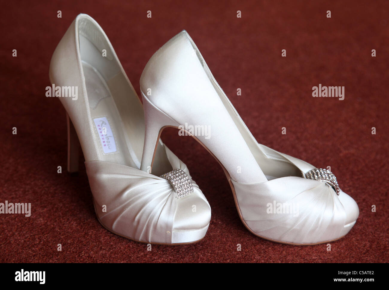 Bridal Wedding Shoes With I Do Message On Sole Isolated On White  Background. Marriage Concept Stock Photo, Picture and Royalty Free Image.  Image 26818048.