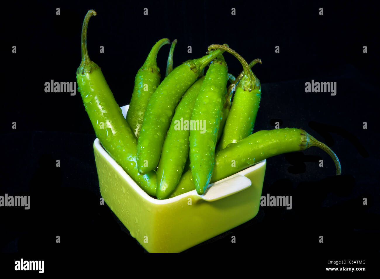 Serrano Peppers are fleshy and meaty with the unique Serrano flavor so popular in Mexican cuisine. Stock Photo