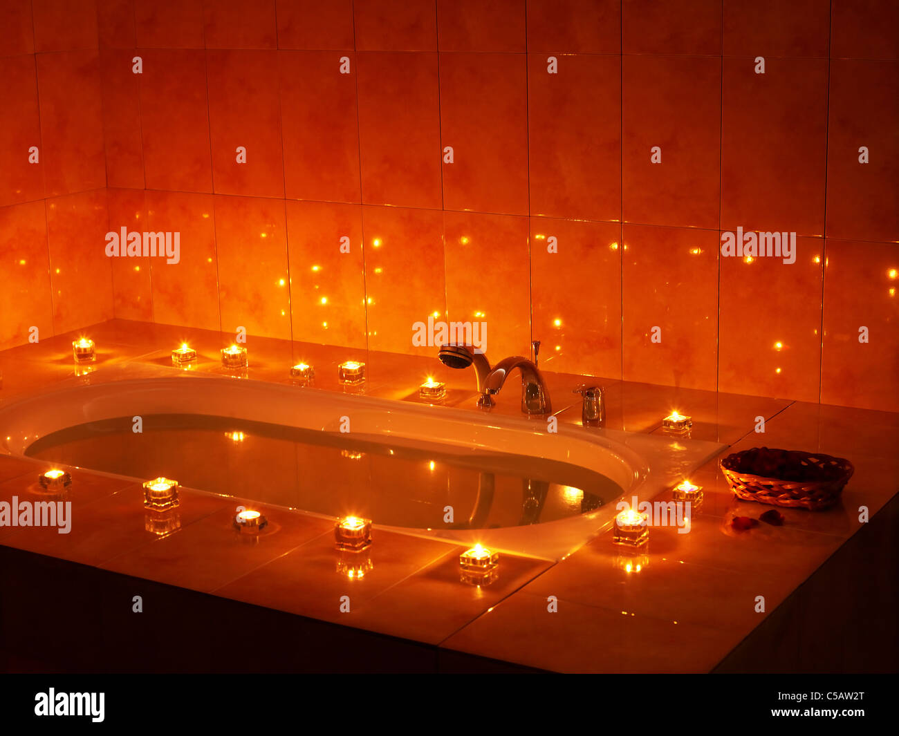 Interior of bath tub with candle Stock Photo Alamy