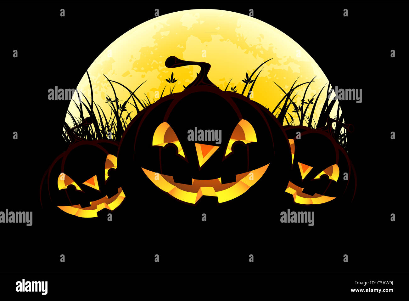 Halloween background with pumpkins in grass and moon Stock Photo - Alamy