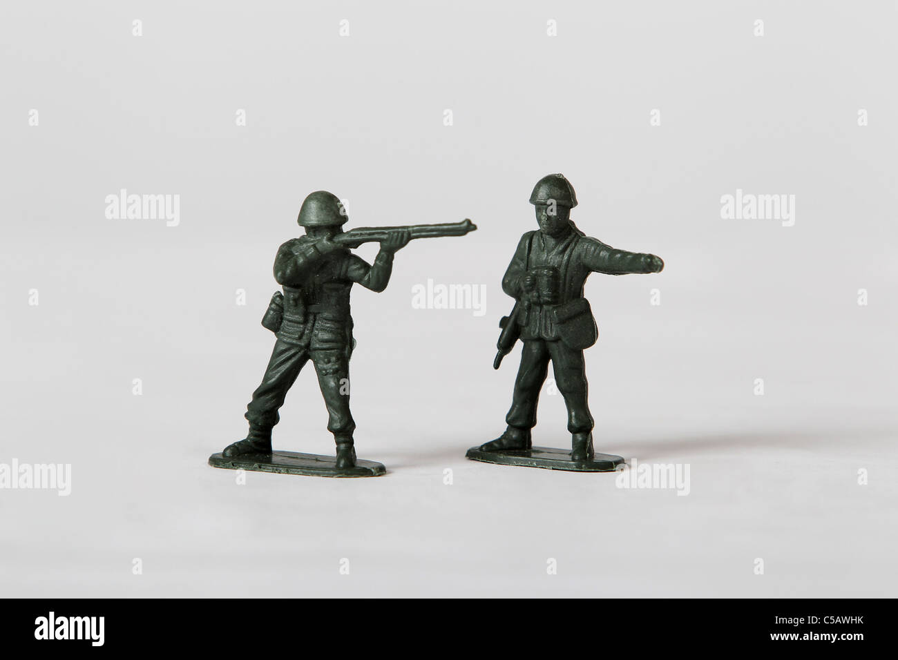 Studio shot of a group of small green plastic toy soldiers. Stock Photo