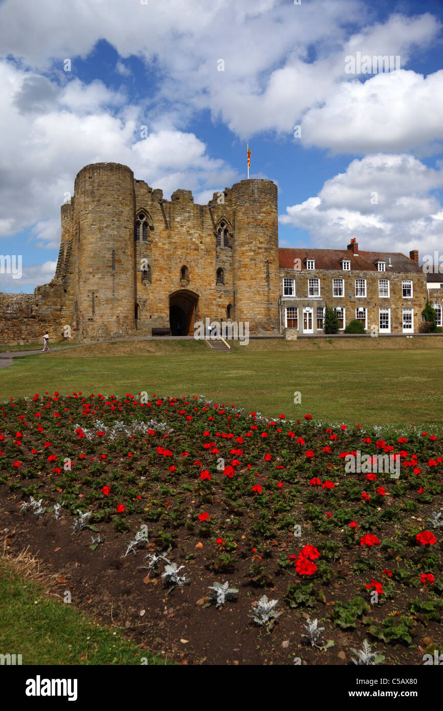 Main twin towered gatehouse of Tonbridge castle, mansion and geraniums