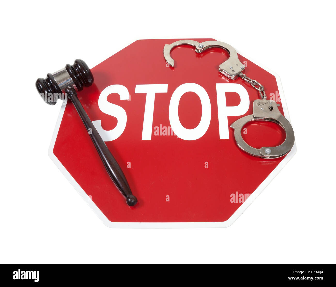 Traffic violations shown by a stop sign with handcuffs and a gavel - path included Stock Photo