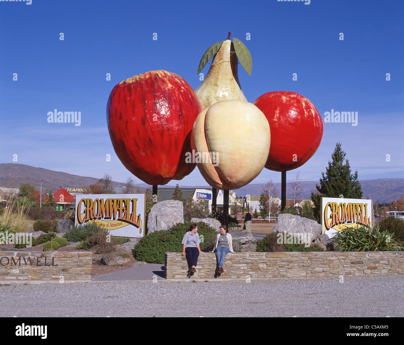 Giant fruit sculpture and welcome sign, Cromwell, Otago Region, South Island, New Zealand Stock Photo
