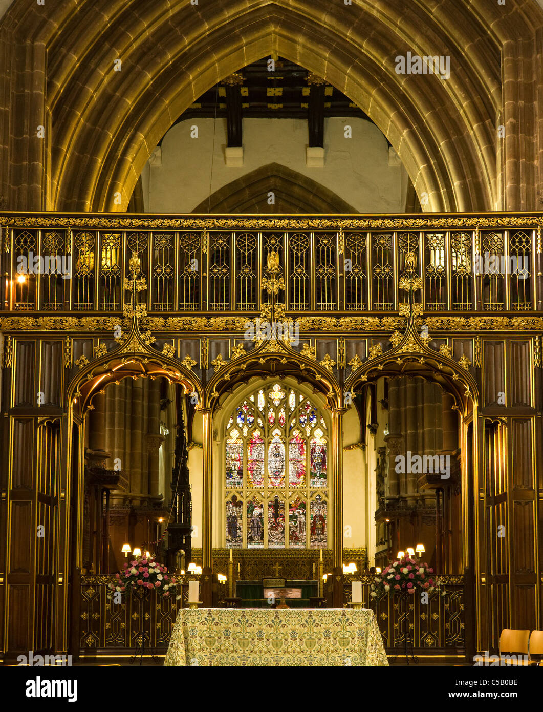 Ornate carved and gold gilded wooden chancel screen, Leicester Cathedral, Leicester, England, UK Stock Photo