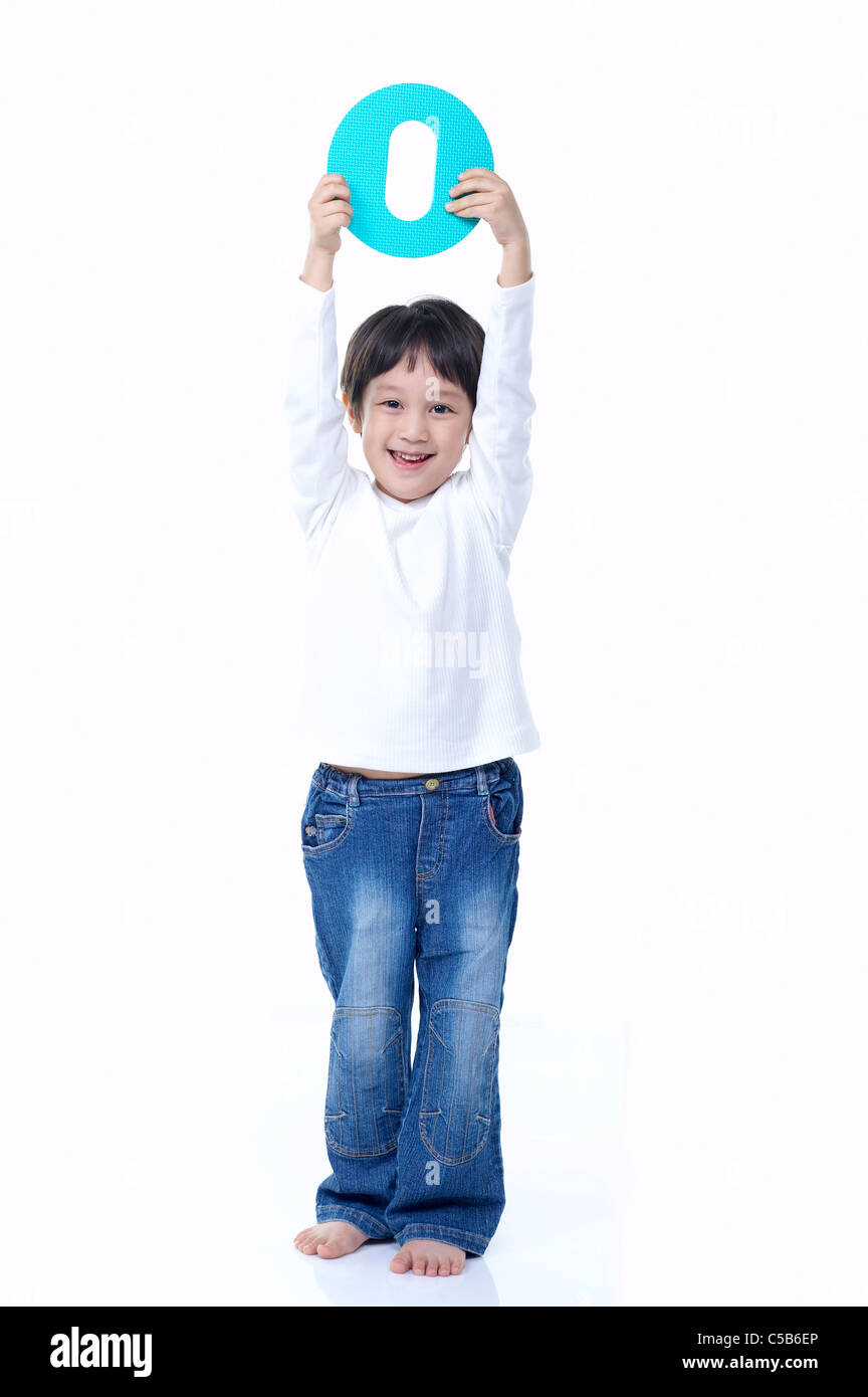 Close-up of children holding text Stock Photo - Alamy