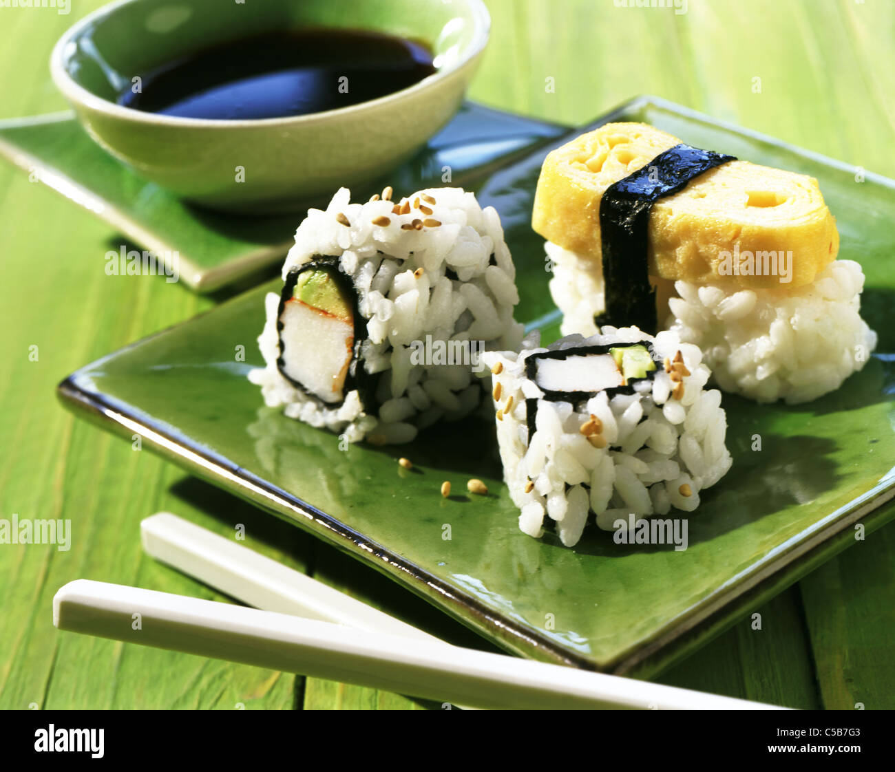 Tableau: Ura Maki sushi and nigiri - sushi with omelette Stock Photo ...