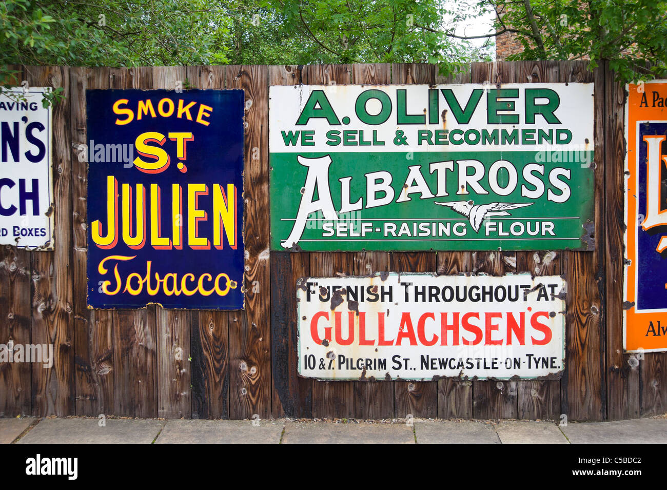 Old advertising boards at Beamish Open Air Museum, County Durham, North East England, UK Stock Photo