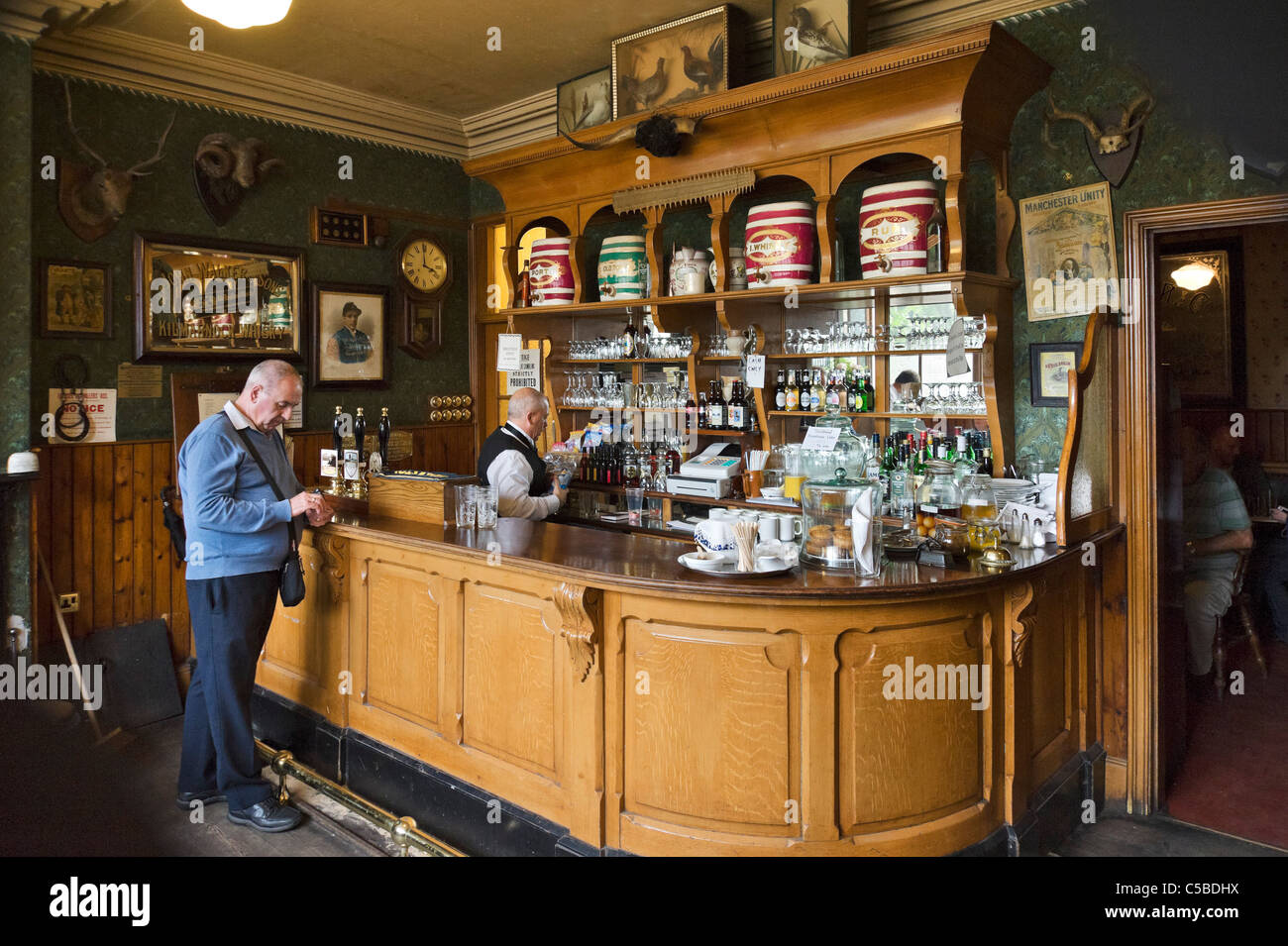 Interior of the Sun Inn pub on the High Street in The Town, Beamish Open Air Museum, County Durham, North East England, UK Stock Photo
