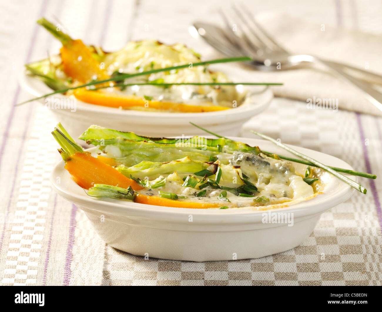 Gratin with sweetheart cabbage and carrots Stock Photo