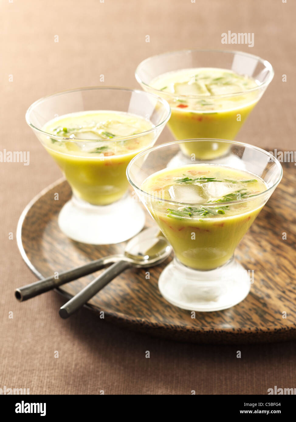 Chilled avocado soup, frozen  glasses Stock Photo