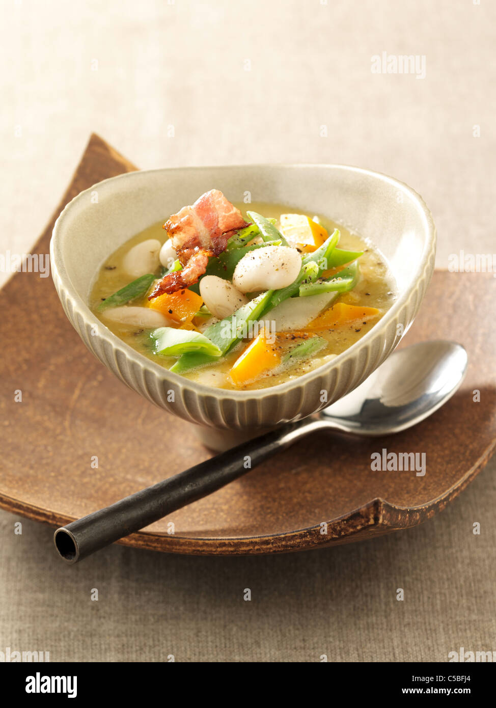 Vegetable soup with beans and bacon Stock Photo