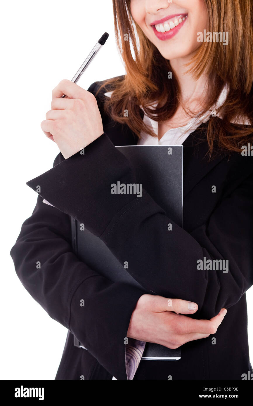 Business lady smiling with file and pen on a white background Stock Photo
