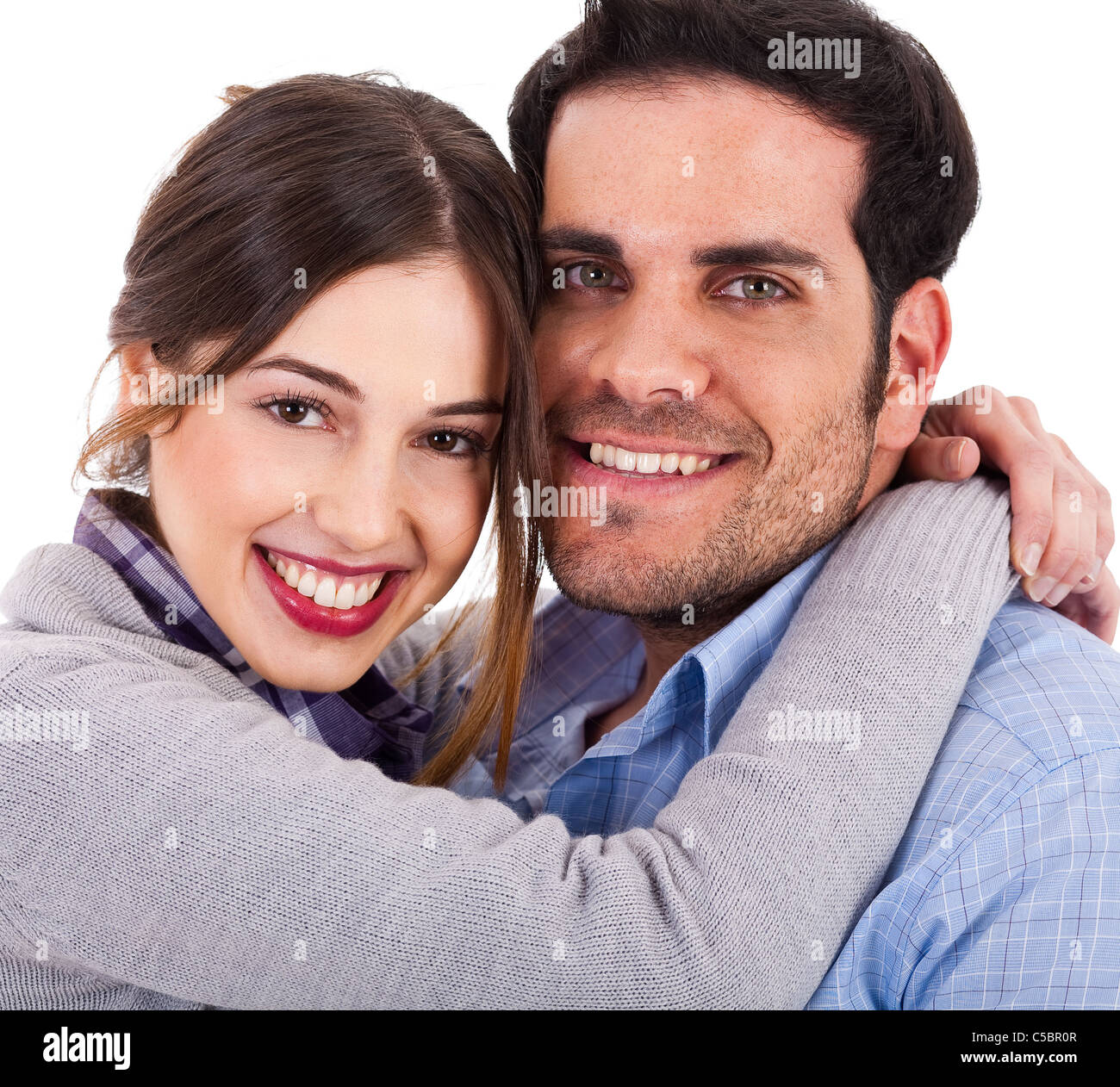 Beautiful young couple closeup shot on a white background Stock Photo ...