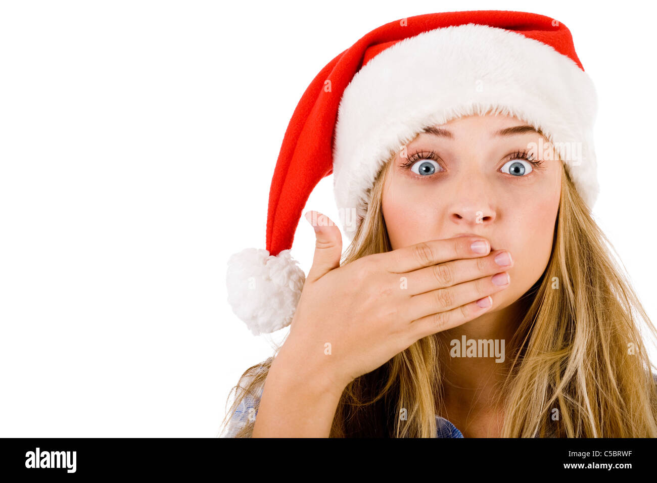Closeup of young women covering her mouth with both hands on a white isolated background Stock Photo