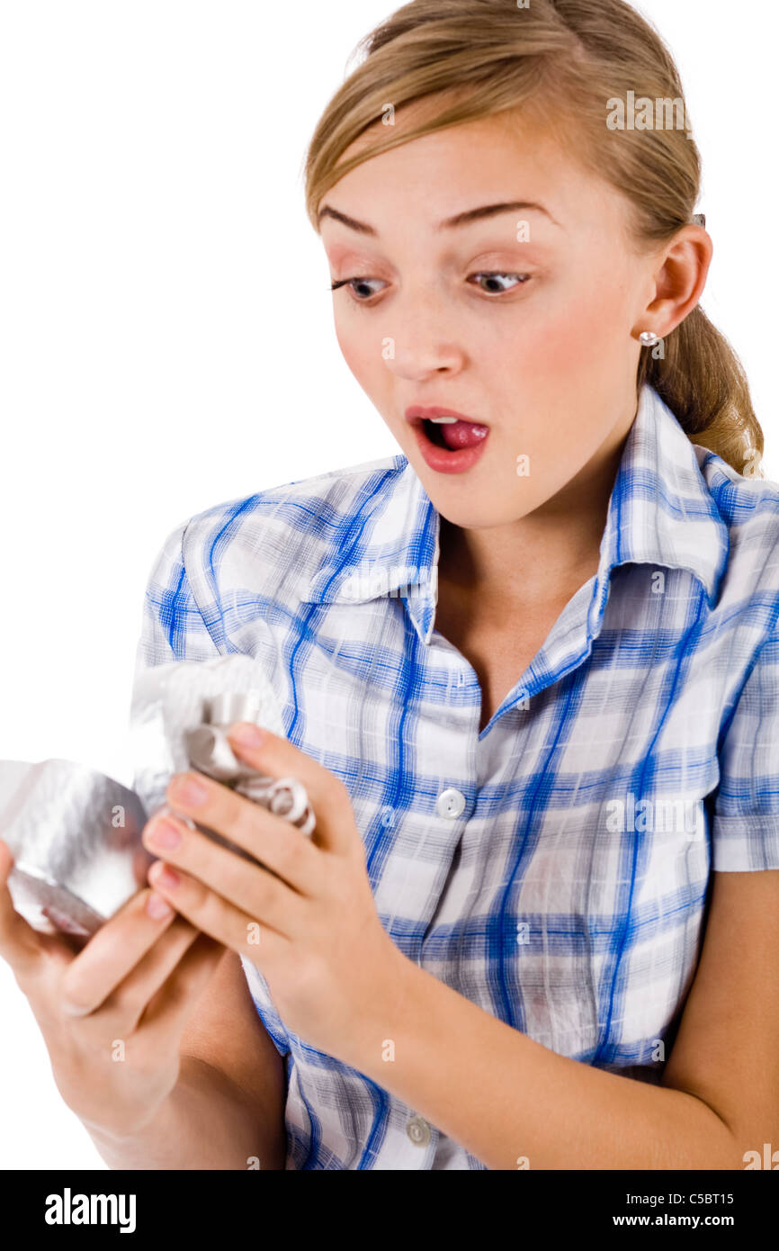 Cute girl opening present on isolated background Stock Photo