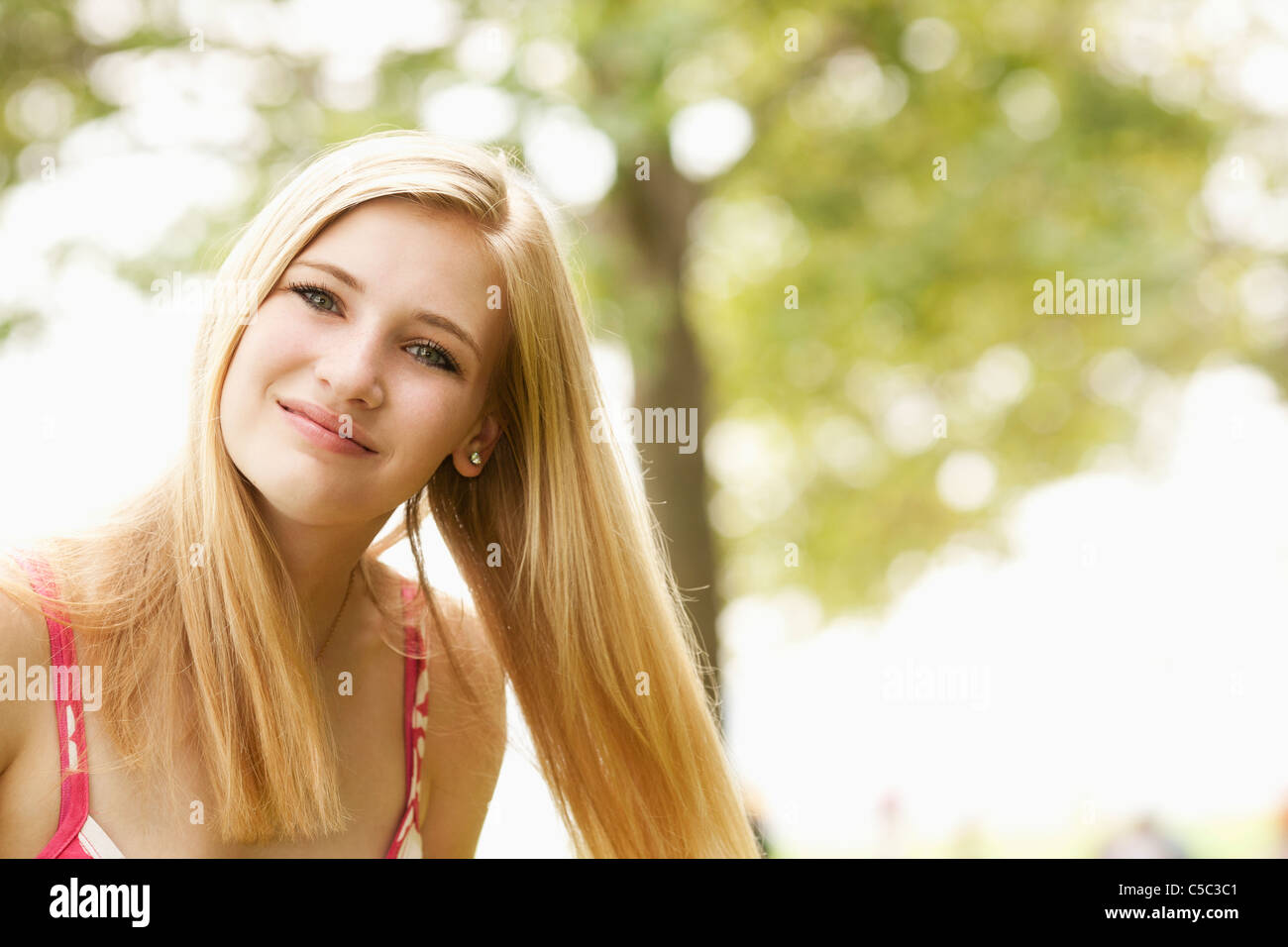 Smiling Caucasian teenage girl Stock Photo