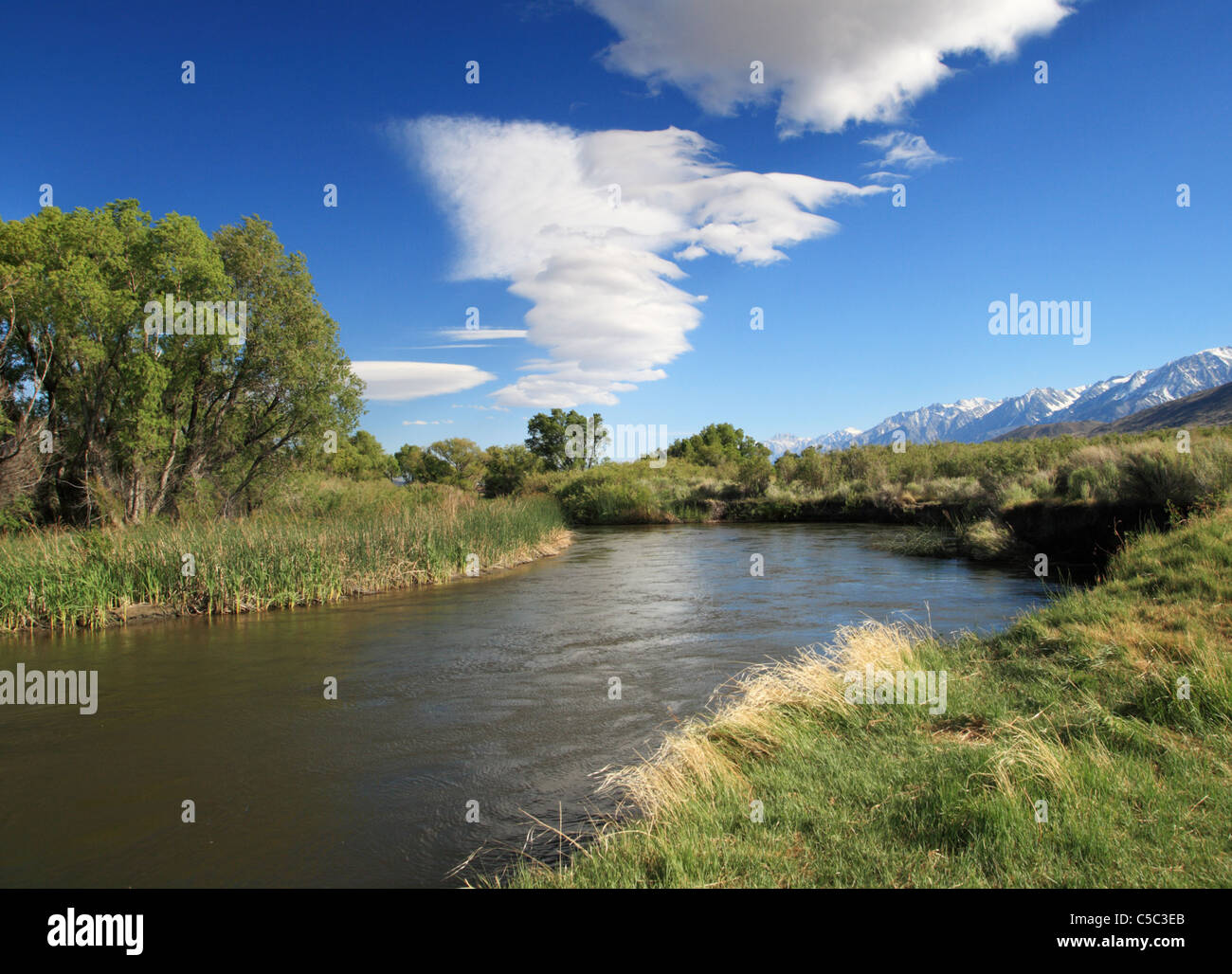 Owens River and a wave cloud beginning to form Stock Photo