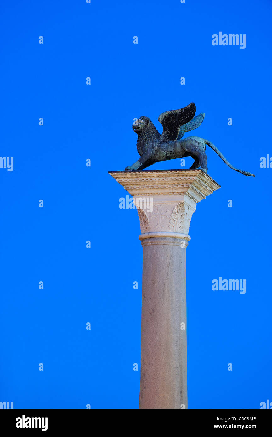 High section of the San Marcos column against clear blue sky Stock Photo
