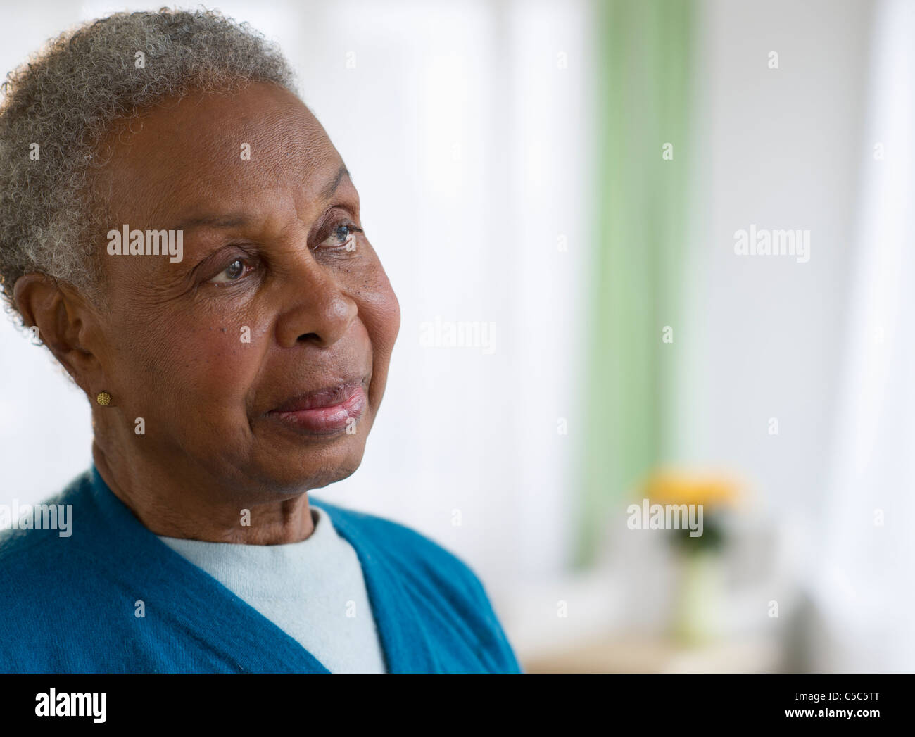 Pensive senior black african woman hi-res stock photography and images ...