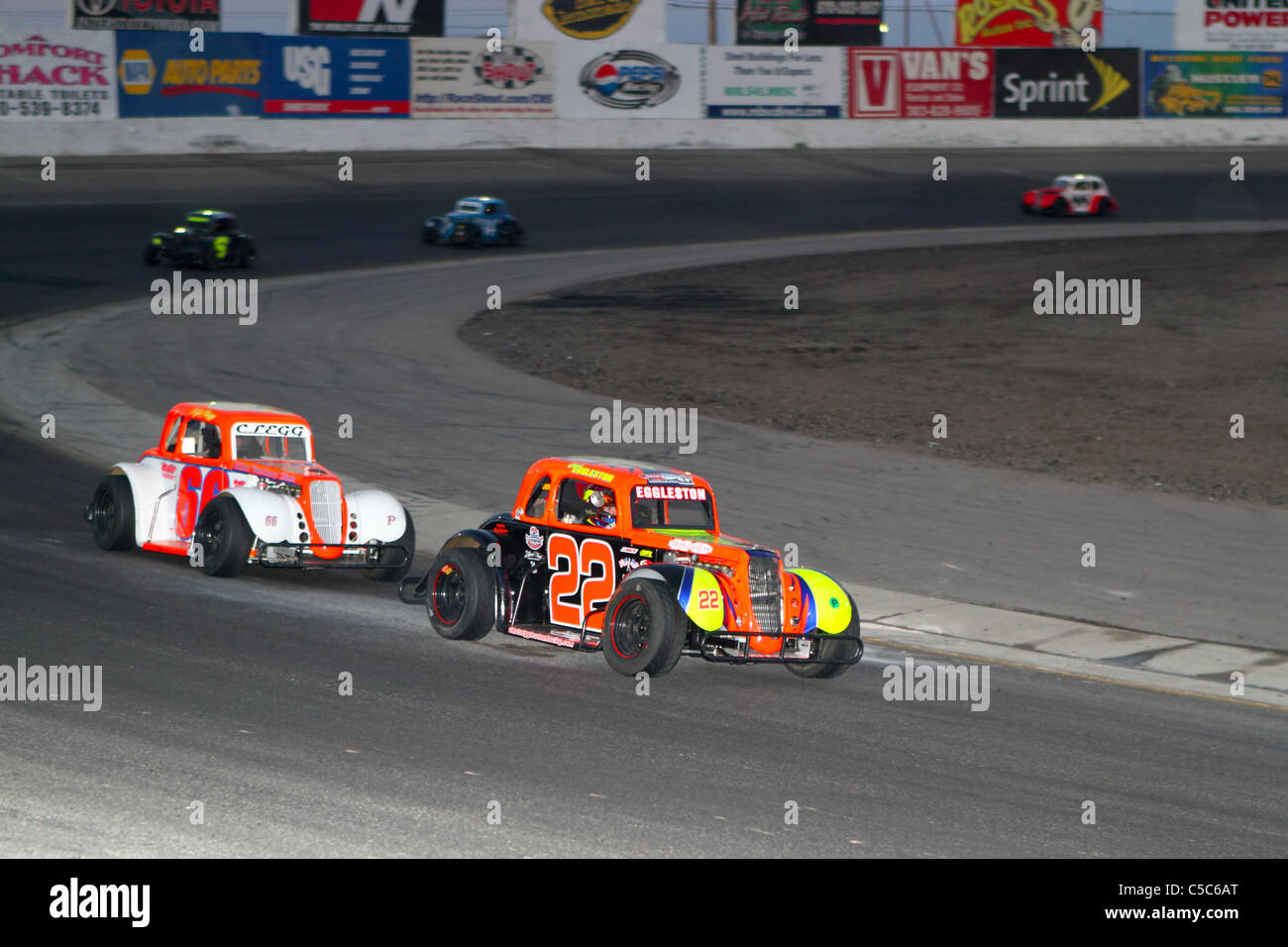 Denver, Colorado - Rookie NASCAR Truck Series driver Chris Eggleston leads the Legends Car race. Stock Photo