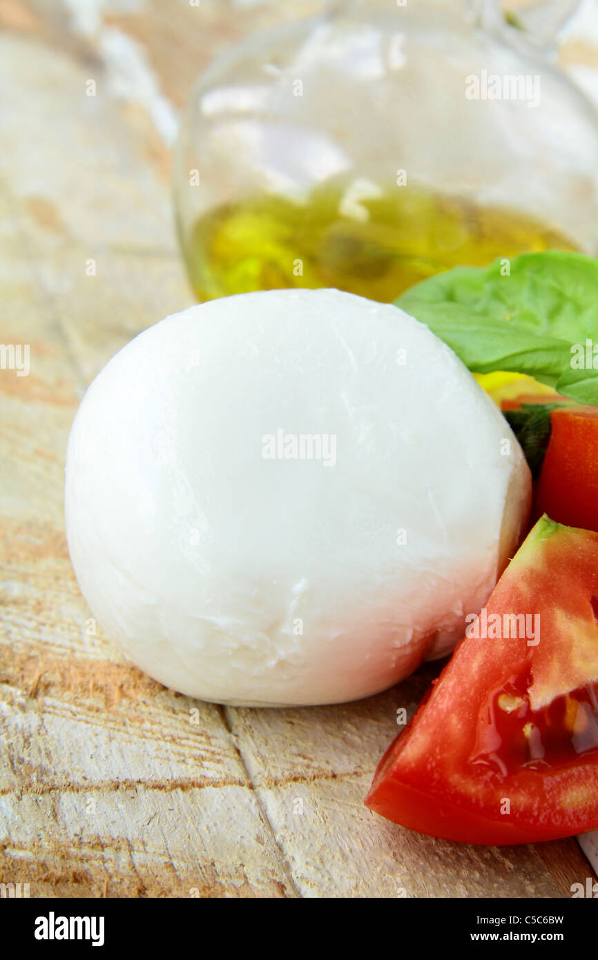 Italian mozzarella cheese with tomato and basil Stock Photo Alamy