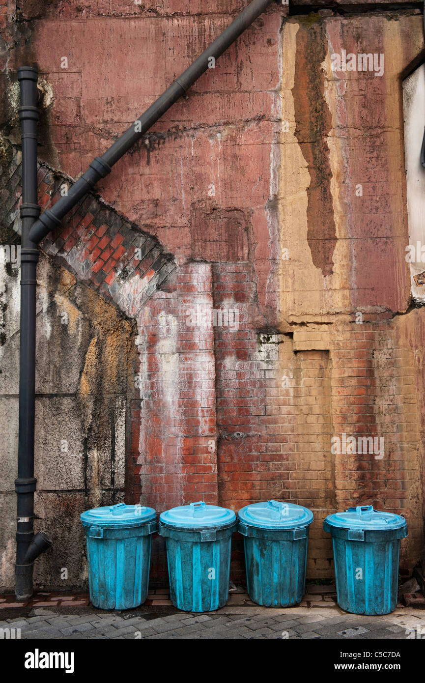 Trash cans in an alley hires stock photography and images Alamy