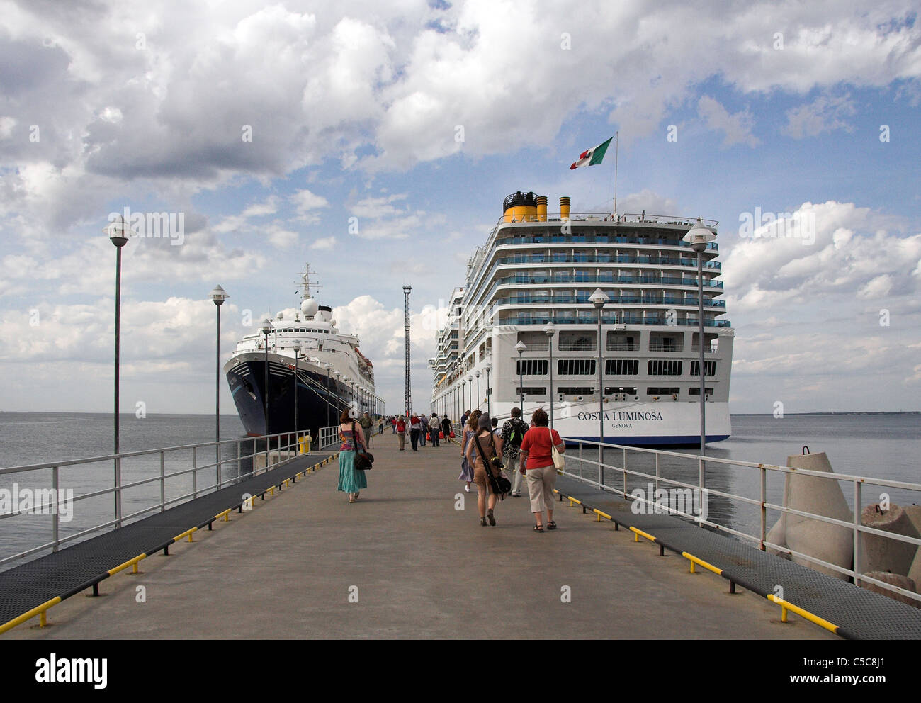 Passengers walking along the quay for embarkation, in the Port of 
